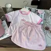Ropa coreana para niños 2025 nuevo verano niñas combinación de colores letra camiseta de manga corta pantalones cortos rosas para niños conjunto de dos piezas moda