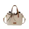 Bolsa de mão feminina transfronteiriça, novo estilo versátil, bolsa tipo saco para o dia a dia, bolsa tote de ombro de grande capacidade, bolsa feminina