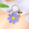 Venta Caliente Transfronteriza Fresco Metal Margarita Abeja Flor Llavero Bolso de Niña Colgante Decorativo Regalo para Estudiante