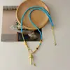 O Mesmo Estilo Popular no Xiaohongshu e Douyin: um Colar de Sorte Turquesa de Luxo Leve e Requintado com Pingente de Elefante Dourado com uma Corrente Universal Destacável