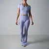 Conjunto de yoga europeo y americano transfronterizo para mujer, conjunto de dos piezas de fitness con camiseta de manga corta y pantalones de yoga de cintura alta que levantan los glúteos