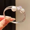 Pulsera minimalista de estilo coreano con estrella de circón y perla, una pieza de joyería única y exquisita, un accesorio ligero y moderno que complementa cualquier atuendo, disponible al por mayor