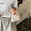 Bolsa Infantil Outono e Inverno Nova Retrô Couro a Óleo Mini Bolsa de Mão Filhote Fofo Bolsa Meia-Lua Orelha Fone de Ouvido Batom Bolsa Transversal