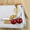 Venta Directa de Fábrica Personalizada Llavero de Cereza Colgante para Bolso Accesorios para Bolsos de Mujer Llavero de Coche Exquisito Venta Caliente Transfronteriza