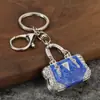 Llavero Creativo de Lujo con Bolsa de Goteo de Aceite y Pedrería, Colgante de Llave de Metal, Accesorio para Mochila, Llavero al por Mayor
