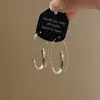 Pendientes geométricos de círculo plateados estilo coreano para mujer, pendientes minimalistas de nicho de alta gama, pendientes de aro lisos elegantes