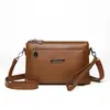 Bolsa Transversal para Mãe de Meia-Idade 2026 Verão Nova Tendência Multicamadas Estilo Mãe e Filha Ombro Único Feminina Pequena de Couro