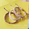 Pulsera de cuerda trenzada estilo europeo y americano color DIY pulsera ajustable a mano trenzado de hilo de jade