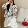 Cárdigan de punto a rayas casual holgado, versátil, de estilo coreano, nuevo para otoño e invierno, para mujer, con un diseño único y atractivo de nicho