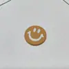 Dopamina Cara Sonriente Accesorios para Joyería DIY Venta al por Mayor Funda para Teléfono Celular Zapatos con Agujeros Pasador Calcetines Paquete de Materiales de Etiqueta de Cuero Parche