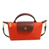 Moda Retro Versátil Transfronteriza Bolso de Mujer Primavera y Verano 2025 Bolso de Mujer Hombro Cruzado Llevado a Mano Nylon de Alta Gama Bolso Dumpling