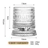 Copo de uísque de cristal giratório em formato de estrela, um design elegante e luxuoso com base de cristal, perfeito para aliviar o estresse e apreciar destilados.