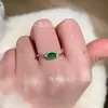 Venta al por mayor de fábrica pequeño rojo departamento material natural peligroso yang anillo de jade verde plata s925 incrustado diseño pequeño fresco exquisito