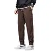 Calça de Veludo Cotelê Masculina Outono Inverno Afunilada Calça Jogger Masculina Calça Jogger Listrada Solta Casual Versátil Harem Calça Longa
