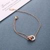 Collar de juego femenino de circón microincrustado de palabra romana. Pendientes de botón. Pulsera Trendy Lujo Ligero Celebridad Cibernética Cadena Clavícula Nicho Simple