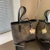 Bolso de Hombro de Moda Versátil Más Vendido para Mujer 2025 Nuevo Coreano de Nicho Bolso Tote de Gran Capacidad para el Trabajo y los Viajes