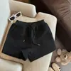 Pantalones cortos de felpa color blanco roto para mujer, adecuados para otoño e invierno, pantalones de pierna ancha de cintura alta en línea A, perfectos para combinar con botas