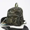 Mochila vintage de camuflaje con estampado de leopardo, nueva moda transfronteriza para mujer, mochila versátil para exteriores, mochila pequeña casual de moda para estudiantes