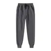 2026 Novo Outono Inverno Masculino Esportes ao Ar Livre Slim Fit Calça de Moletom Europeia Americana Cor Sólida Moda Esportiva Forro de Fleece Calça Longa Masculino e Feminino