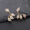Pendientes Transfronterizos de Hojas de Zirconia Pendientes de Flor de Industria Pesada Pendientes de Cobre Electroplateado Protección Ambiental Pendientes Joyería Dulce
