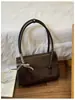Bolsa de mano estilo retro, de alta gama, gran capacidad para mujer, nueva colección 2025, moderna y única, adecuada para ir al trabajo