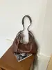 Bolso de hombro retro transfronterizo para mujer, nuevo y moderno estilo coreano 2026, bolso de hombro versátil de gran capacidad, bolso cruzado con forma de media luna