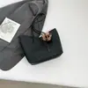 Bolsa de Ombro Grande Capacidade para o Dia a Dia 2026 Novo Estilo Feminino Bolsa Simples de Ombro Simples Elegante Bolsa Tote Ins Modelo Novo 2026