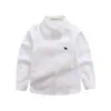 Camisa de manga larga para niños para primavera y otoño, camisa de lunares con cuello para niños, estilo casual europeo y americano, fabricante transfronterizo, ropa para niños al por mayor en stock