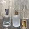 En stock B115-30ml50ml100ml botella de perfume de vidrio transparente, botella de recarga cosmética/botella vacía con spray de presión