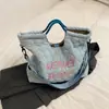 Nueva Bolsa de Estudiante para Viajes Diarios de Gran Capacidad para Mujeres 2025 Bolso Bandolera Bolso Tote Bolso de Hombro Bordado con Letras Bolso Cruzado Ligero