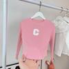 Camiseta de Primavera y Otoño para Niñas Estilo Occidental para Bebé Infantil Distintiva Moderna con Estampado de Letras Coreanas Irregular a la Moda Camiseta Básica