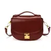 Bolso de Silla de Montar de Alta Gama de Comercio Exterior para Mujer 2026 Nuevo Estilo Bolso de Mano Retro a la Moda Diseño de Nicho Bolso de Hombro Único Cruzado