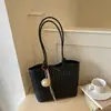 Bolso tote tejido con patrón transfronterizo para mujer, nuevo modelo de otoño 2026, sensación de lujo ligero de nicho de alta gama, bolso de hombro grande para ir al trabajo