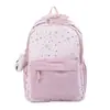 Nova mochila transfronteiriça de alta moda com estampa de estrelas para estudantes do ensino fundamental II, estilo coreano moderno, grande capacidade, leve e confortável