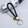 Llavero de cuerda de cuero trenzado para pareja, llavero de bronce cepillado hecho a mano para hombre y mujer, llavero de coche, regalo, cuerda de mano