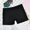 Color puro simple piel blanca negra anti-exposición primavera y verano pantalones de seguridad para mujer cintura media leggings de modal entrega de una sola pieza