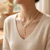 Artículo de Moda Popular Transfronterizo Europeo y Americano con un Toque de Lujo, Colgante de Borla de Flor con Perlas Artificiales, Cadena Femenina para la Clavícula