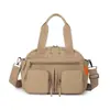 Bolso de mano moderno con múltiples bolsillos para mujer, bolso de hombro ligero de color liso para el día a día, bolso cruzado versátil, casual, simple, personalizable