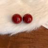 Aretes redondos rojos retro de Año Nuevo de aguja plateada, aretes simples Joker de moda, aretes de temperamento de lujo ligero, fabricantes, venta al por mayor