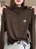 Elegante camiseta de manga larga para mujer con cuello de media apertura abotonado, moderna y versátil, con un toque de alta gama, un básico de otoño