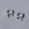 Pendientes de aro dobles cruzados tridimensionales de temperamento versátil, tachuelas de personalidad única, pendientes de metal de cobre chapado en oro blanco de alta gama de nicho