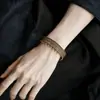 Sino dos Ventos Étnico Pulseira Flor Tangcao Estilo Étnico Exótico Dai Étnico Borla Pulseira Versátil Pulseira Atacado