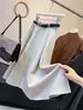 Traje Falda Nuevo Estilo Coreano Otoño 2026 Mujer Cintura Alta Adelgazante Para Viajar Caída Media Longitud Dobladillo Ancho Falda Paraguas