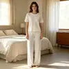 Conjunto de pijama transfronterizo para mujer europeo y americano, nuevo estilo primavera y otoño, ropa de casa de algodón suave, estampado de color liso, conjunto cómodo y casual de dos piezas