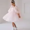Vestido de Niña de un Año Estilo Nuevo Europeo y Americano Vestido de Malla Esponjosa con Flor Tridimensional y Lazo