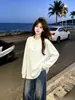 Camiseta de manga larga con botones, estilo coreano, moderna, de nicho, personalidad simple, para ir al trabajo, para mujer, nuevo estilo casual de otoño 2026