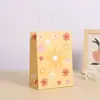 Bolsa de regalo creativa serie girasol regalo a mano papel kraft bolsa de regalo portátil bolsa de flor pequeña en stock