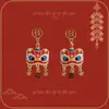 Pendientes de felpa de danza del león de moda para mujer, nuevo estilo 2026, aspecto de alta gama, perfectos para invierno.