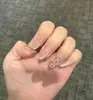 Las uñas cortas y portátiles más vendidas de Xiaohongshu: Puntas de Uñas Ojo de Gato con Lunares, Uñas Postizas Frescas y Lindas
