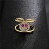 Suministro transfronterizo de Aogu Moda europea y americana nuevo cobre chapado en oro de 18 quilates micro incrustado circón personalidad cara sonriente anillo abierto